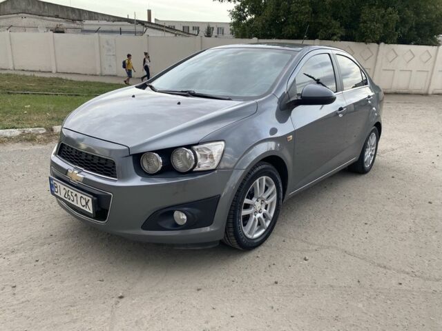 Серый Шевроле Авео, объемом двигателя 1.6 л и пробегом 143 тыс. км за 5600 $, фото 1 на Automoto.ua