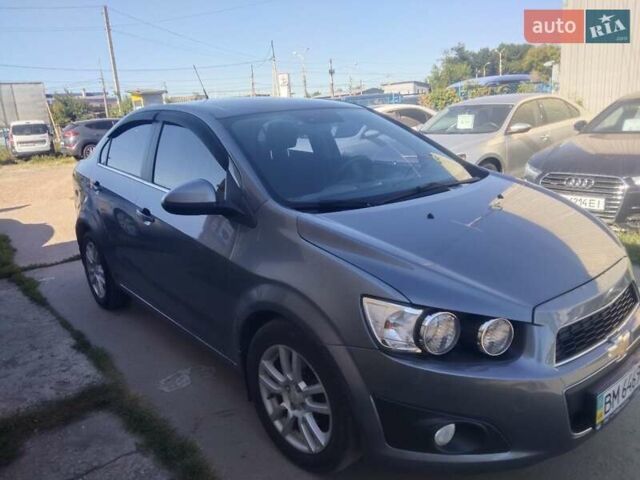 Серый Шевроле Авео, объемом двигателя 1.4 л и пробегом 185 тыс. км за 6000 $, фото 1 на Automoto.ua