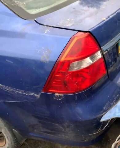 Синий Шевроле Авео, объемом двигателя 1.6 л и пробегом 260 тыс. км за 999 $, фото 1 на Automoto.ua