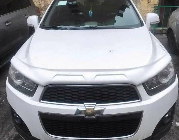 Белый Шевроле Каптива, объемом двигателя 2.4 л и пробегом 260 тыс. км за 9900 $, фото 1 на Automoto.ua