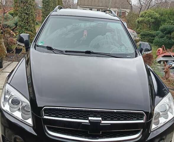 Черный Шевроле Каптива, объемом двигателя 2.41 л и пробегом 173 тыс. км за 7450 $, фото 1 на Automoto.ua