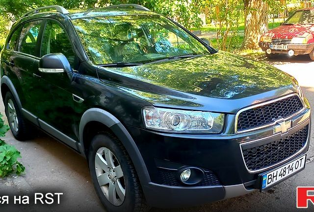 Черный Шевроле Каптива, объемом двигателя 2.4 л и пробегом 180 тыс. км за 9500 $, фото 1 на Automoto.ua