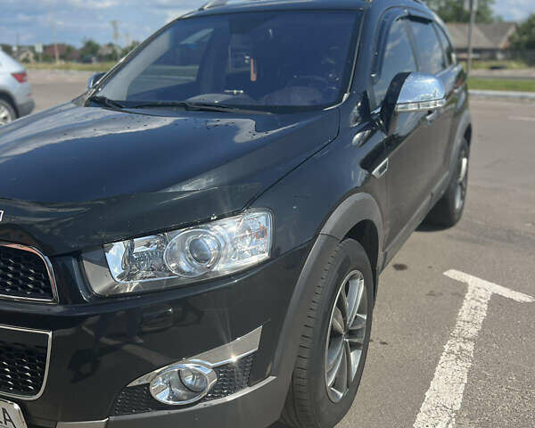 Черный Шевроле Каптива, объемом двигателя 2.2 л и пробегом 206 тыс. км за 11499 $, фото 1 на Automoto.ua