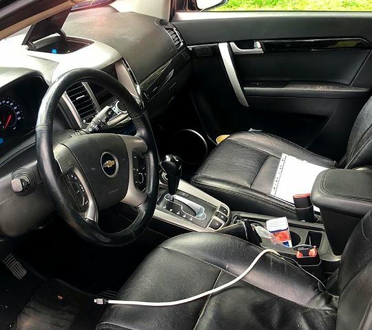 Черный Шевроле Каптива, объемом двигателя 2.4 л и пробегом 166 тыс. км за 7500 $, фото 1 на Automoto.ua