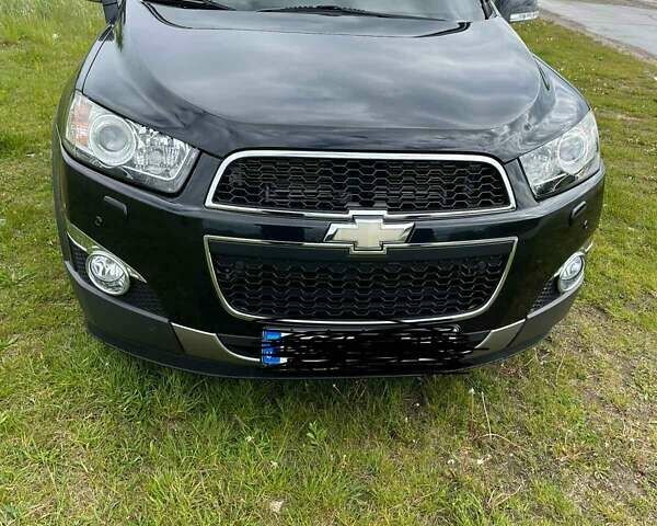 Черный Шевроле Каптива, объемом двигателя 2.23 л и пробегом 138 тыс. км за 12500 $, фото 1 на Automoto.ua