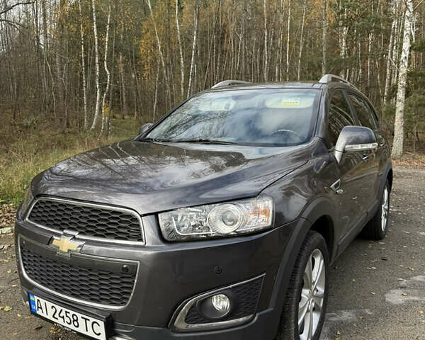 Черный Шевроле Каптива, объемом двигателя 2.2 л и пробегом 113 тыс. км за 12900 $, фото 1 на Automoto.ua