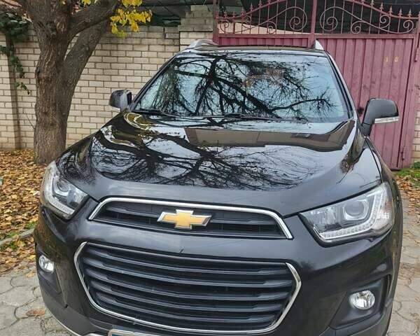 Черный Шевроле Каптива, объемом двигателя 2.38 л и пробегом 172 тыс. км за 11000 $, фото 1 на Automoto.ua