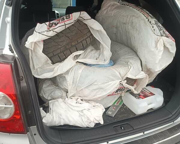 Серый Шевроле Каптива, объемом двигателя 2.4 л и пробегом 218 тыс. км за 6600 $, фото 1 на Automoto.ua