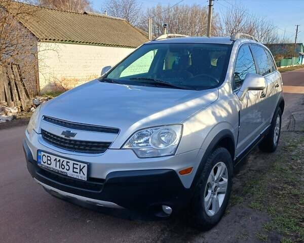 Серый Шевроле Каптива, объемом двигателя 2.38 л и пробегом 287 тыс. км за 9000 $, фото 1 на Automoto.ua