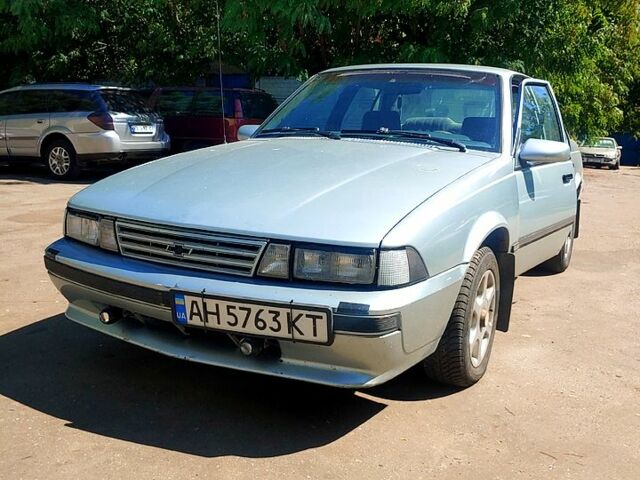 Сірий Шевроле Кавалер, об'ємом двигуна 2.2 л та пробігом 300 тис. км за 1800 $, фото 1 на Automoto.ua