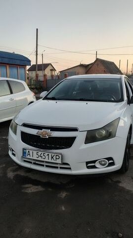 Белый Шевроле Круз, объемом двигателя 1.8 л и пробегом 412 тыс. км за 7500 $, фото 1 на Automoto.ua