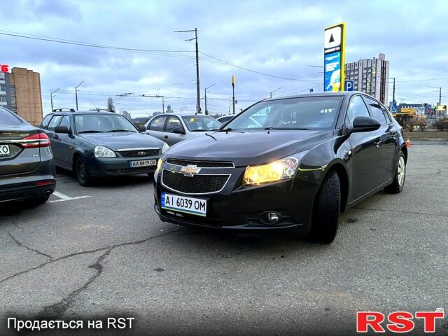 Черный Шевроле Круз, объемом двигателя 1.8 л и пробегом 173 тыс. км за 6700 $, фото 1 на Automoto.ua