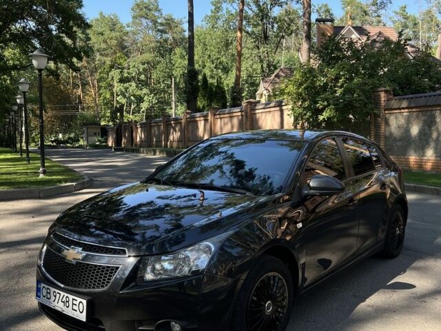 Чорний Шевроле Круз, об'ємом двигуна 1.8 л та пробігом 147 тис. км за 7231 $, фото 1 на Automoto.ua
