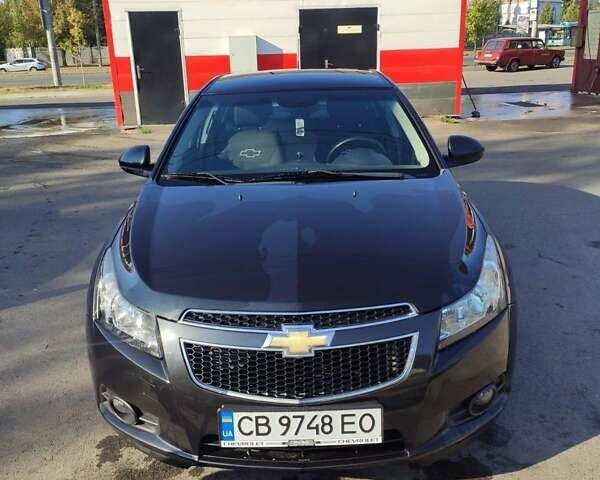 Черный Шевроле Круз, объемом двигателя 1.8 л и пробегом 140 тыс. км за 7000 $, фото 1 на Automoto.ua