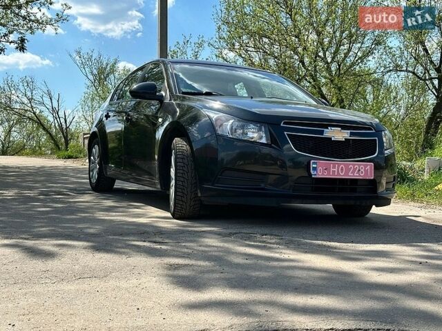 Черный Шевроле Круз, объемом двигателя 1.6 л и пробегом 175 тыс. км за 6280 $, фото 1 на Automoto.ua