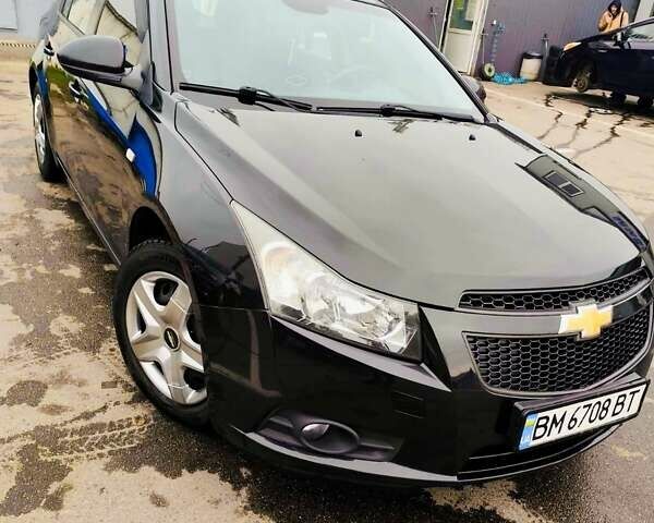 Черный Шевроле Круз, объемом двигателя 1.6 л и пробегом 268 тыс. км за 5450 $, фото 1 на Automoto.ua