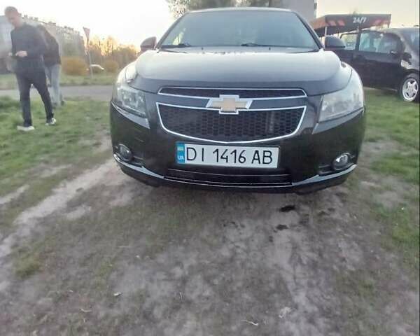 Черный Шевроле Круз, объемом двигателя 1.6 л и пробегом 207 тыс. км за 5800 $, фото 1 на Automoto.ua