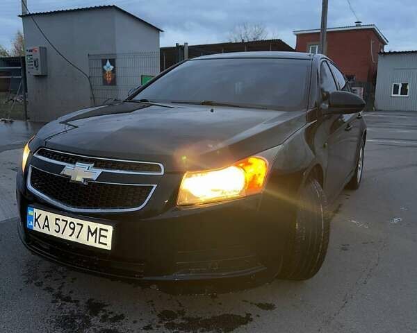 Черный Шевроле Круз, объемом двигателя 1.6 л и пробегом 135 тыс. км за 4900 $, фото 1 на Automoto.ua