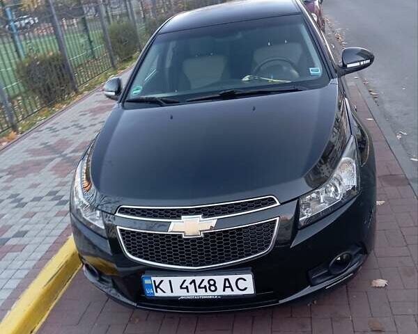 Черный Шевроле Круз, объемом двигателя 1.8 л и пробегом 112 тыс. км за 7450 $, фото 1 на Automoto.ua