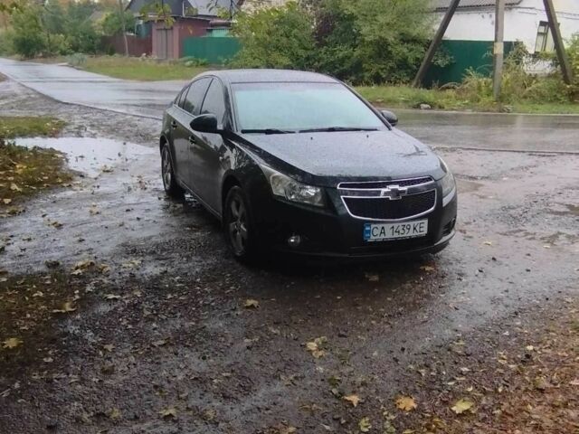 Черный Шевроле Круз, объемом двигателя 1.6 л и пробегом 258 тыс. км за 7200 $, фото 1 на Automoto.ua