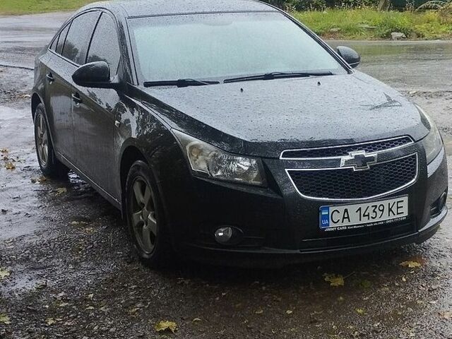 Черный Шевроле Круз, объемом двигателя 1.6 л и пробегом 260 тыс. км за 6500 $, фото 1 на Automoto.ua