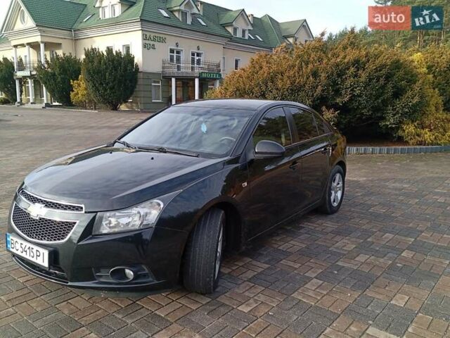 Черный Шевроле Круз, объемом двигателя 1.8 л и пробегом 234 тыс. км за 5600 $, фото 1 на Automoto.ua