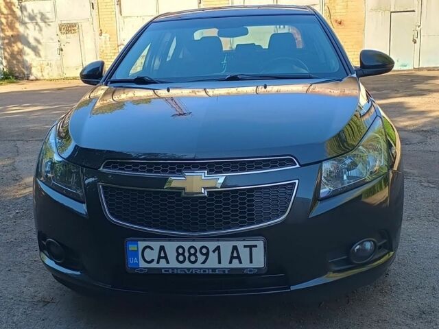 Черный Шевроле Круз, объемом двигателя 1.8 л и пробегом 149 тыс. км за 7800 $, фото 1 на Automoto.ua