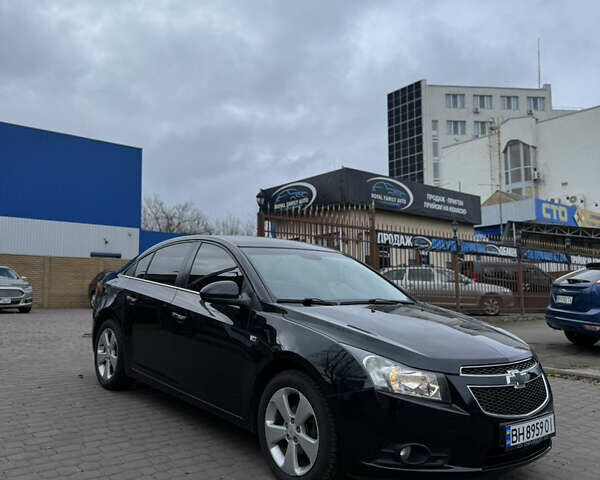 Черный Шевроле Круз, объемом двигателя 1.8 л и пробегом 226 тыс. км за 7700 $, фото 1 на Automoto.ua