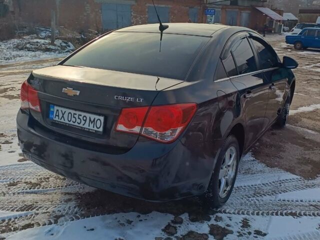 Чорний Шевроле Круз, об'ємом двигуна 1.8 л та пробігом 210 тис. км за 6999 $, фото 1 на Automoto.ua