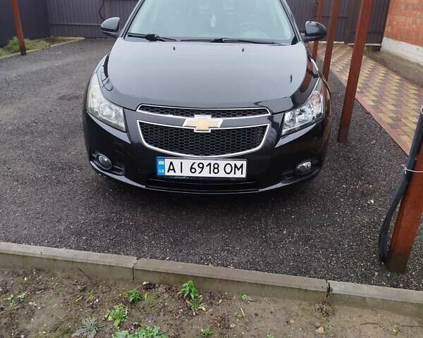 Черный Шевроле Круз, объемом двигателя 2 л и пробегом 252 тыс. км за 6200 $, фото 1 на Automoto.ua