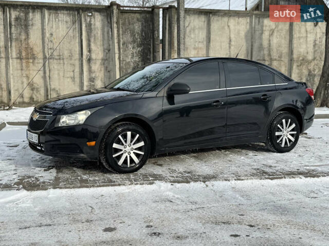 Черный Шевроле Круз, объемом двигателя 1.8 л и пробегом 255 тыс. км за 5600 $, фото 1 на Automoto.ua