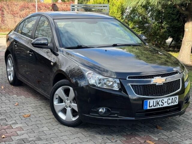 Черный Шевроле Круз, объемом двигателя 1.8 л и пробегом 120 тыс. км за 5199 $, фото 1 на Automoto.ua