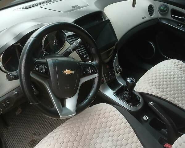 Черный Шевроле Круз, объемом двигателя 2 л и пробегом 320 тыс. км за 6800 $, фото 1 на Automoto.ua