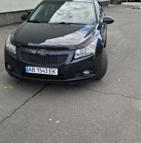 Черный Шевроле Круз, объемом двигателя 1.8 л и пробегом 314 тыс. км за 5500 $, фото 1 на Automoto.ua