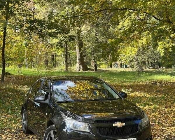 Черный Шевроле Круз, объемом двигателя 1.8 л и пробегом 177 тыс. км за 6400 $, фото 1 на Automoto.ua