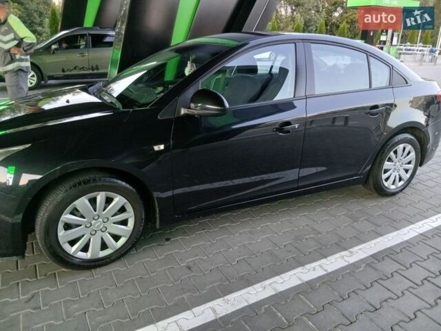 Черный Шевроле Круз, объемом двигателя 1.8 л и пробегом 148 тыс. км за 6750 $, фото 1 на Automoto.ua