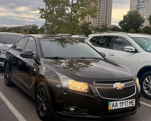 Черный Шевроле Круз, объемом двигателя 1.8 л и пробегом 105 тыс. км за 7500 $, фото 1 на Automoto.ua