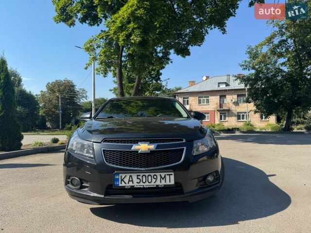 Черный Шевроле Круз, объемом двигателя 1.8 л и пробегом 219 тыс. км за 8000 $, фото 1 на Automoto.ua