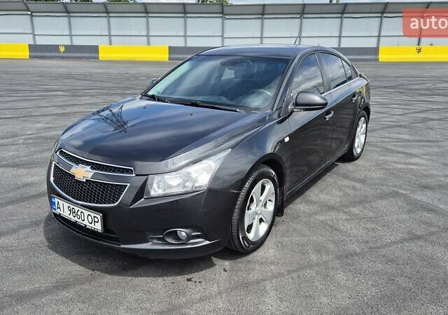 Черный Шевроле Круз, объемом двигателя 1.8 л и пробегом 160 тыс. км за 8500 $, фото 1 на Automoto.ua