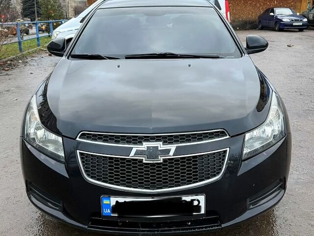 Черный Шевроле Круз, объемом двигателя 1.8 л и пробегом 18000 тыс. км за 5650 $, фото 1 на Automoto.ua