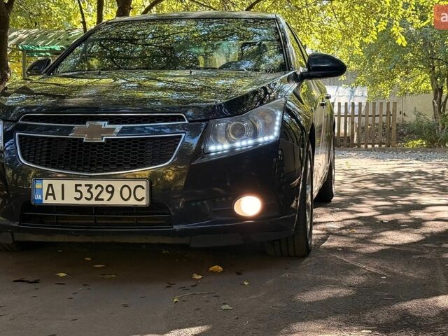 Черный Шевроле Круз, объемом двигателя 1.8 л и пробегом 192 тыс. км за 6500 $, фото 1 на Automoto.ua