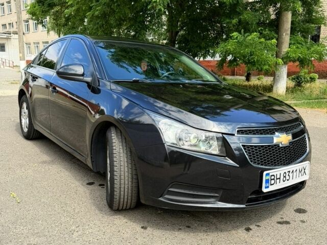 Черный Шевроле Круз, объемом двигателя 1.36 л и пробегом 267 тыс. км за 6900 $, фото 1 на Automoto.ua
