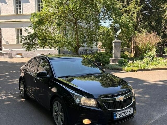 Черный Шевроле Круз, объемом двигателя 1.36 л и пробегом 230 тыс. км за 6650 $, фото 1 на Automoto.ua