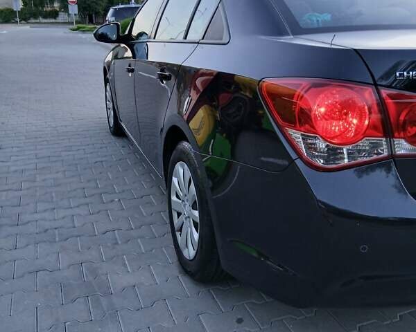 Чорний Шевроле Круз, об'ємом двигуна 1.8 л та пробігом 147 тис. км за 7650 $, фото 1 на Automoto.ua