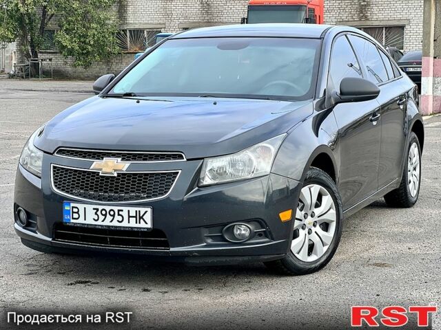 Черный Шевроле Круз, объемом двигателя 1.8 л и пробегом 235 тыс. км за 6000 $, фото 1 на Automoto.ua