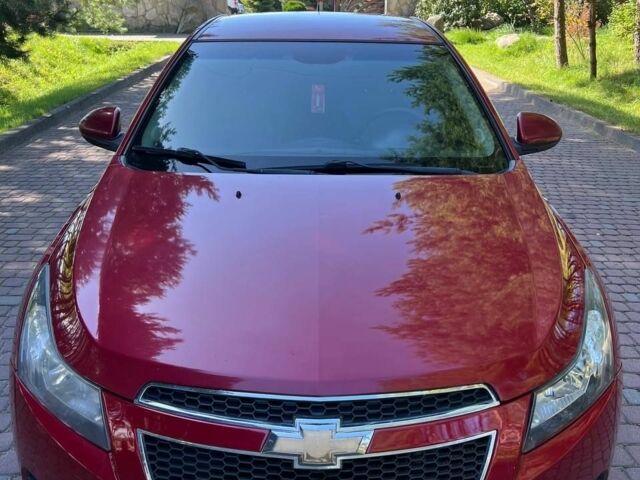 Красный Шевроле Круз, объемом двигателя 1.6 л и пробегом 316 тыс. км за 5600 $, фото 1 на Automoto.ua