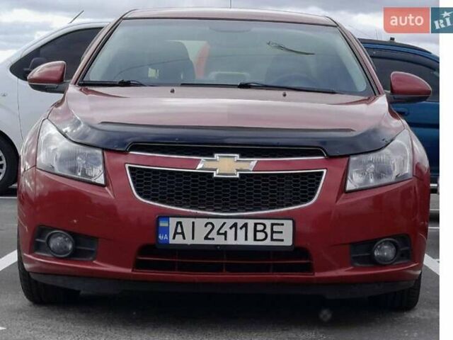 Красный Шевроле Круз, объемом двигателя 1.6 л и пробегом 202 тыс. км за 6400 $, фото 1 на Automoto.ua