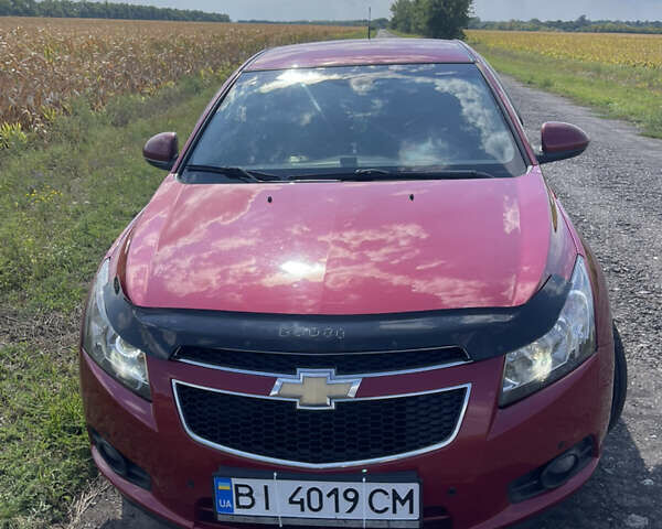 Красный Шевроле Круз, объемом двигателя 1.99 л и пробегом 181 тыс. км за 9000 $, фото 1 на Automoto.ua