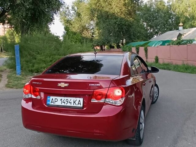 Красный Шевроле Круз, объемом двигателя 1.8 л и пробегом 176 тыс. км за 6800 $, фото 1 на Automoto.ua
