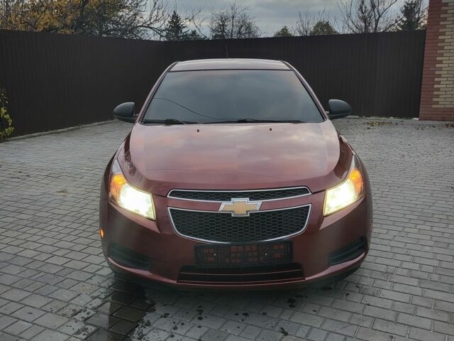 Красный Шевроле Круз, объемом двигателя 1.8 л и пробегом 174 тыс. км за 6300 $, фото 1 на Automoto.ua